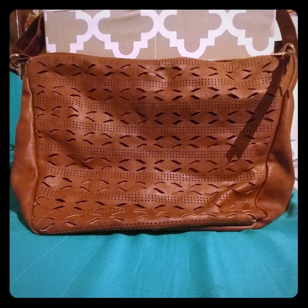New Cut out design. Large crossbody purse